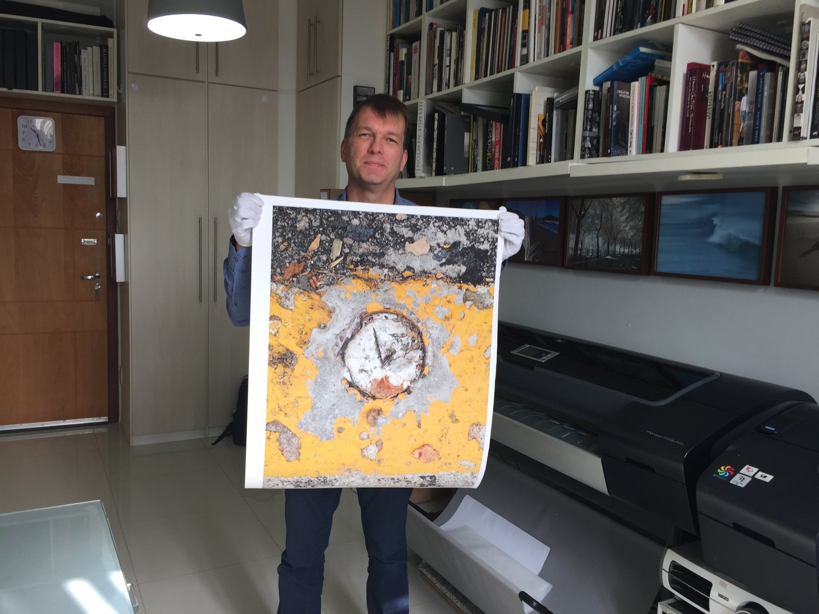 Artist Jussi Koria with a SDWLK ART print